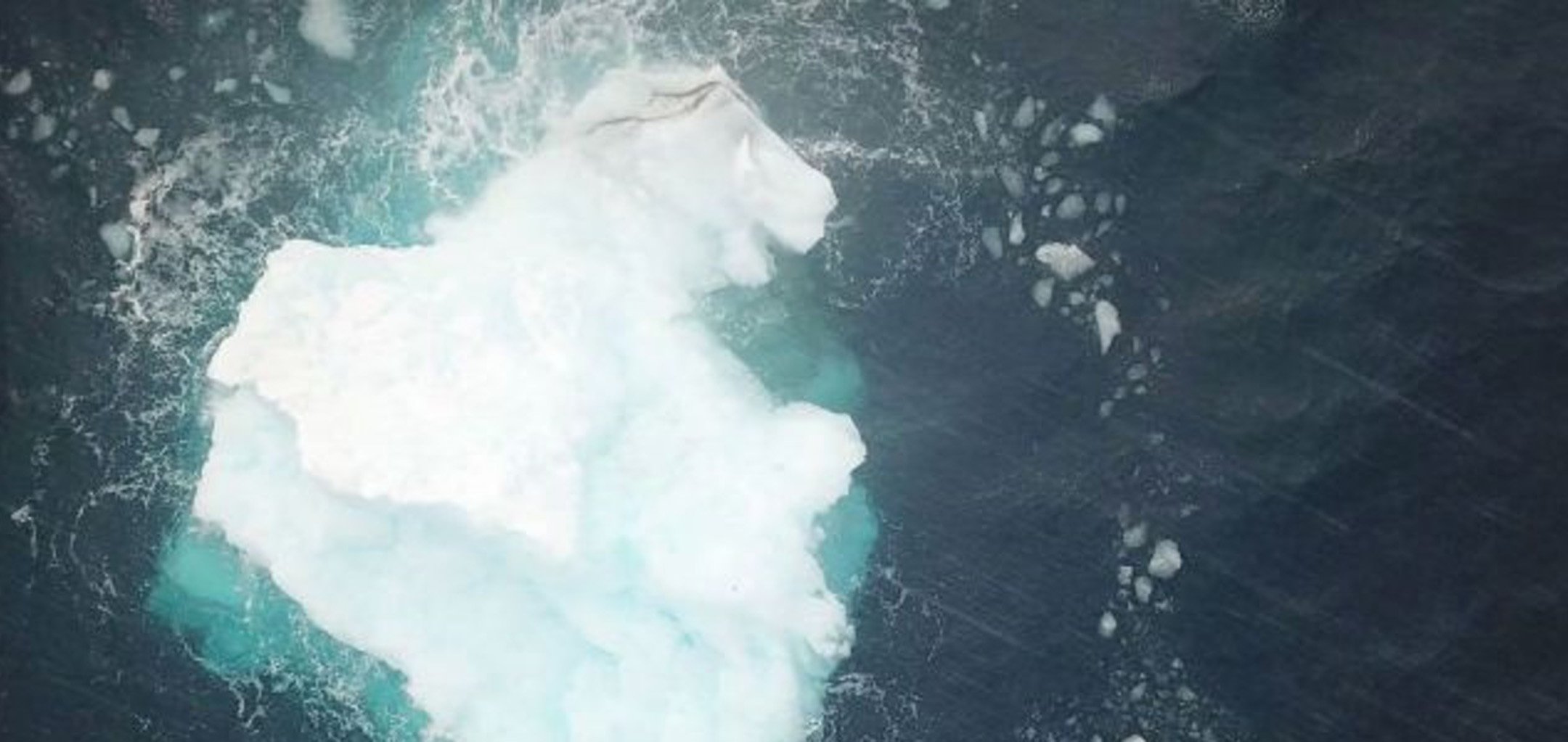 A still of an iceberg from above from 'FREM' (2019)