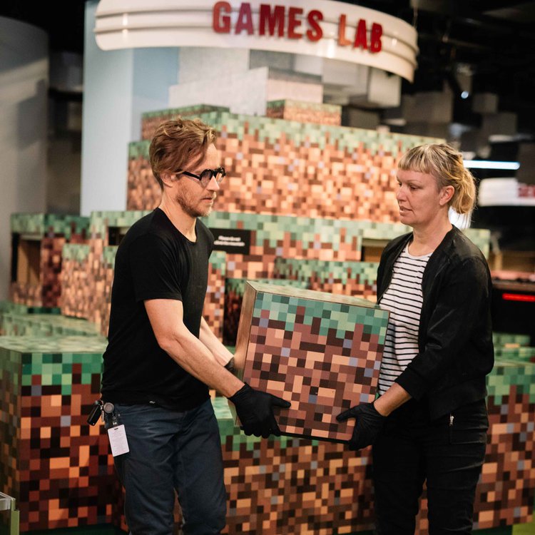 Everything must go- ACMI exhibition technicians deinstalling the Minecraft sculpture. Image credit: Phoebe Powell