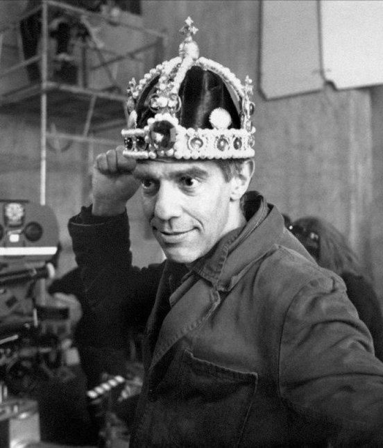 Director Derek Jarman wearing a crown