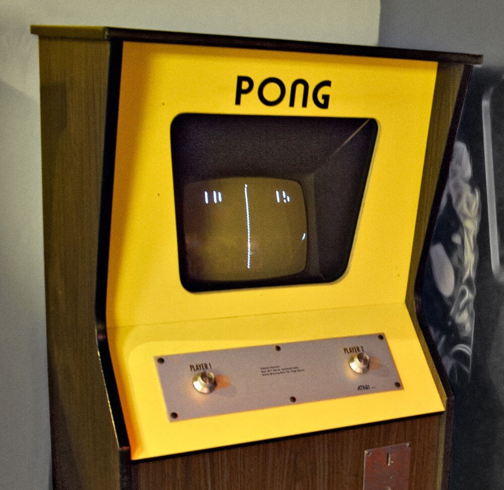 Pong game machine in yellow.jpg