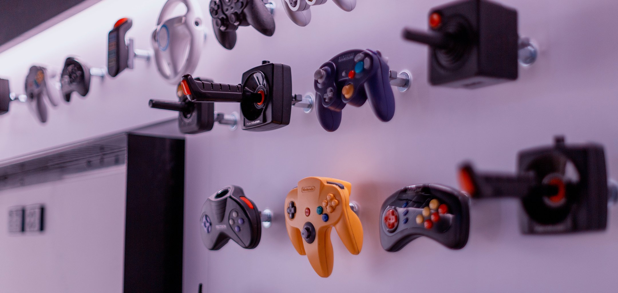 Wall of videogame controllers at ACMI