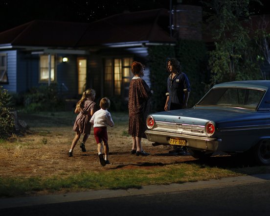 The cast of Little Tornadoes (2022) - outside at night with car
